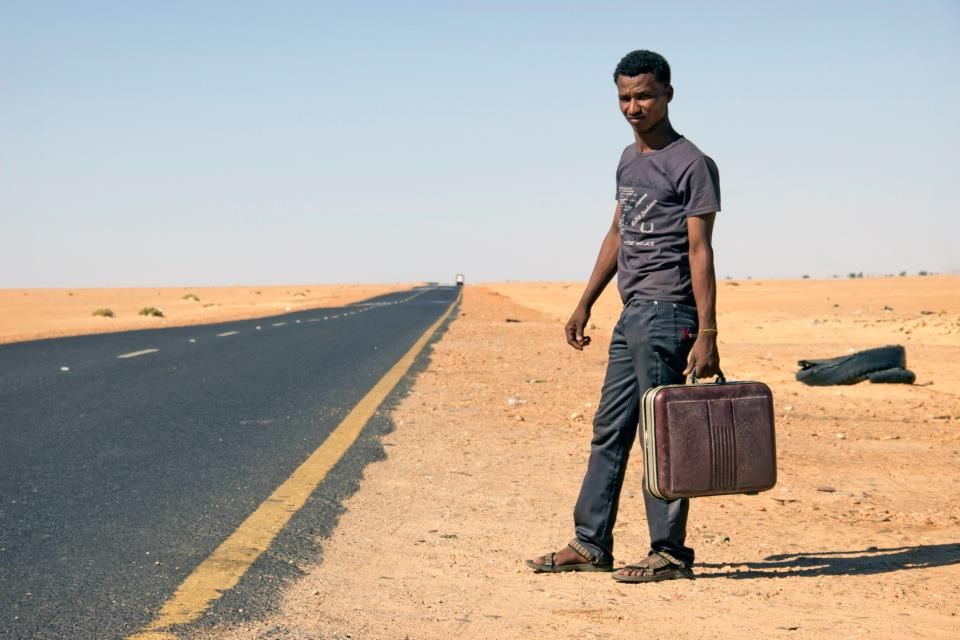 Hitchhiking is very common in northern Sudan. This man is on his way to his family to celebrate Eid al-Adha.