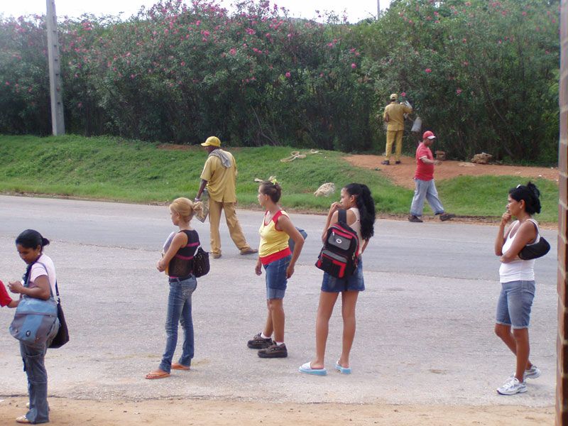 Fabzgy took this pictures while hitchhiking in Cuba, the two guys dressed in yellow pants and shirts are the "amarillos"