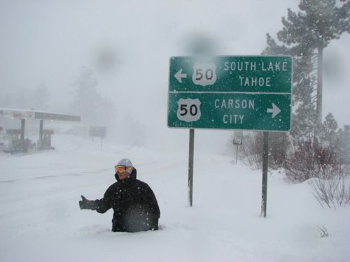 Hitchhiking in deep snow.