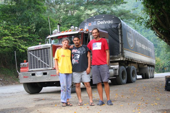 Hitchhikers Katja and Augustas with a driver of a hitched a truck in Colombia