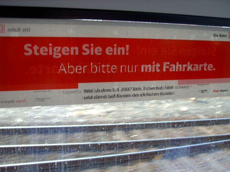Photo taken while train - hitchhiking a train in Germany. Translation: "All aboard! But please only with a ticket." ...heeheehee let's jump.